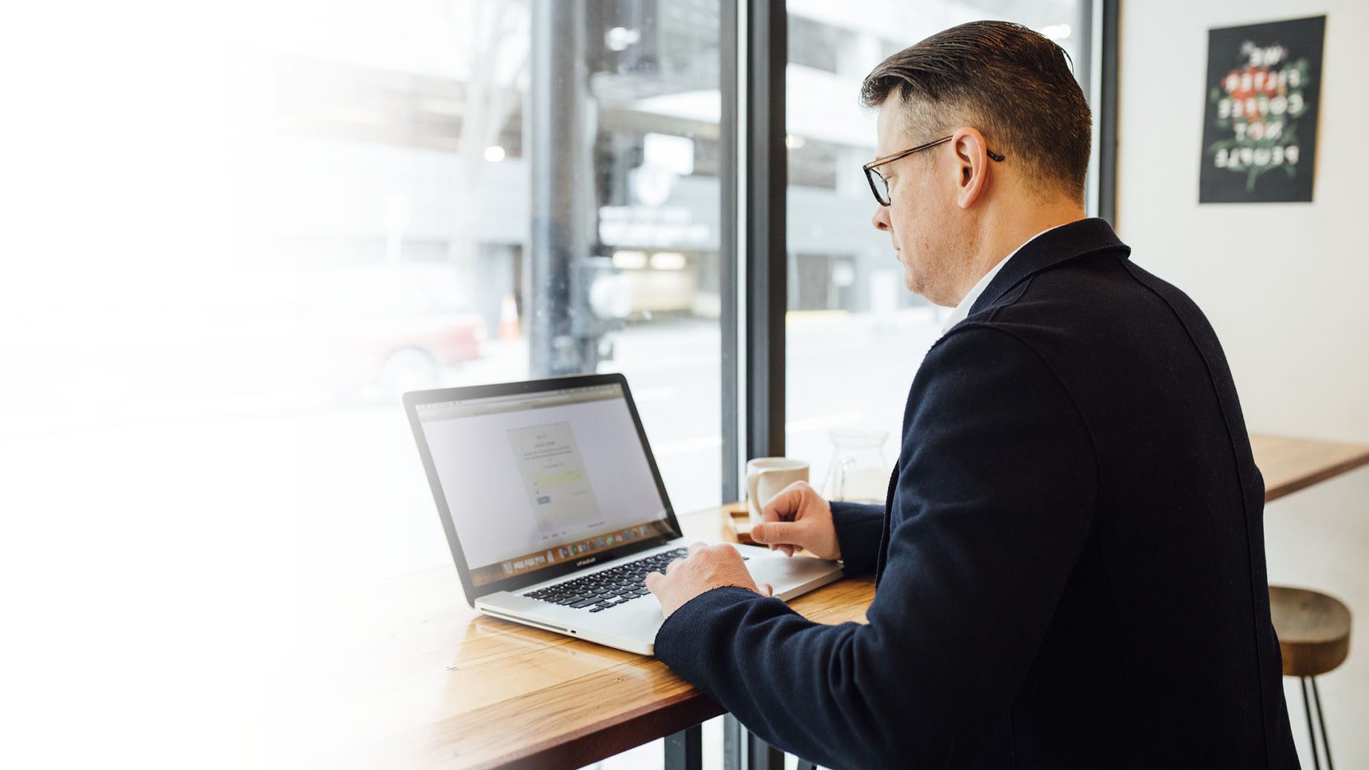 business-businessman-using-laptop mortgage-advice-insurance-spratt-financial